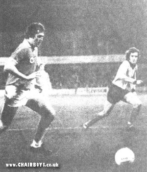 Keith Searle closes in on Alan Welsh during the first-half at Dean Court - Bournemouth v Wycombe - picture from Bucks Free Press
