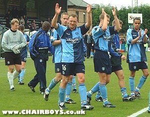Wanderers players take a lap of honour