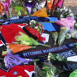 Tributes left at Adams Park for Mark