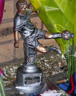 Tributes left at Adams Park for Mark