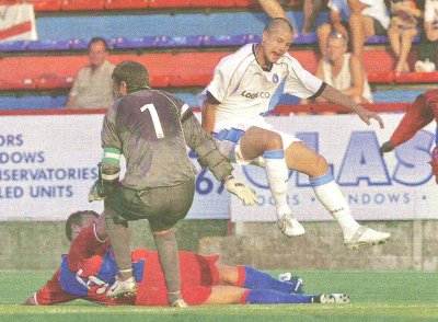 Jonny Dixon in action at Aldershot - picture from Bucks Free Press