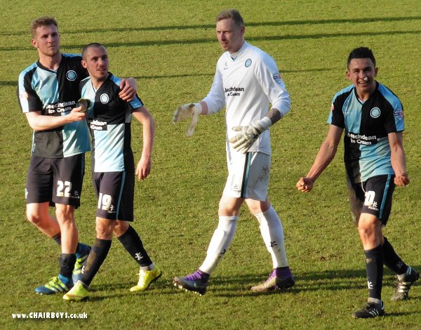 Jason McCarthy, Michael Harriman, Ryan Allsop and Luke O'Nein celebrate after the final whistle versus Mansfield