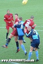 Andy Thomson gets up for a header