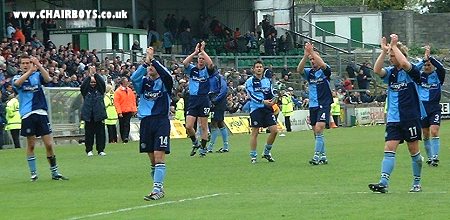 Wanderers players applaude the loyal band of Wycombe supporters who made the trip to Plymouth