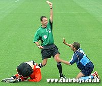 Danny Senda pleads with the referee but to no avail