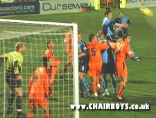 Roger Johnson gets in a header against Colchester