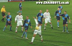 Wanderers defend in numbers against Posh