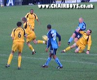 Keith Ryan gets in a shot against Rushden