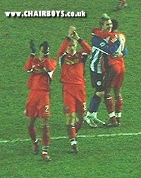 Danny Senda and Andy Reilly acknowledge the Wycombe support at Hillsborough