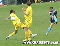 Ian Simpemba shoots against Tranmere