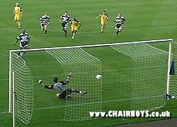 Frank Talia is beaten from the spot at Darlington