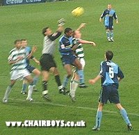Frank Talia and Zema Abbey defend the Wycombe penalty area versus Yeovil