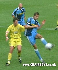 Roger Johnson volleys home Wycombe's first goal