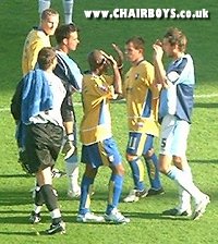 Gus Uhlenbeek and Roger Johnson after the final whistle