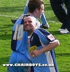 Tommy Mooney celebrates at Rushden