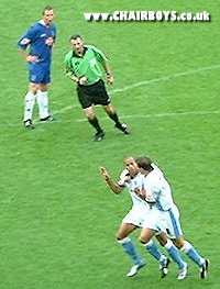 Nathan Tyson and Joe Burnell celebrate at Stockport