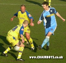 Mike Williamson in action against his former club