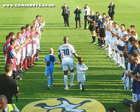 Steve Brown makes his entrance at Adams Park