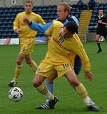Paul Emblen tangles with Joe Keith 