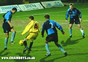 Ian Simpemba, Ben Townsend and Andy Baird give close attention to Matty Potter