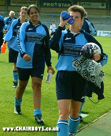 Esther Morley grabs a drink after the final whistle