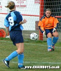 Louise Plumridge gathers a shot against Redbridge Raiders