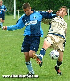 Lee Parrack is pulled back to earn a free-kick